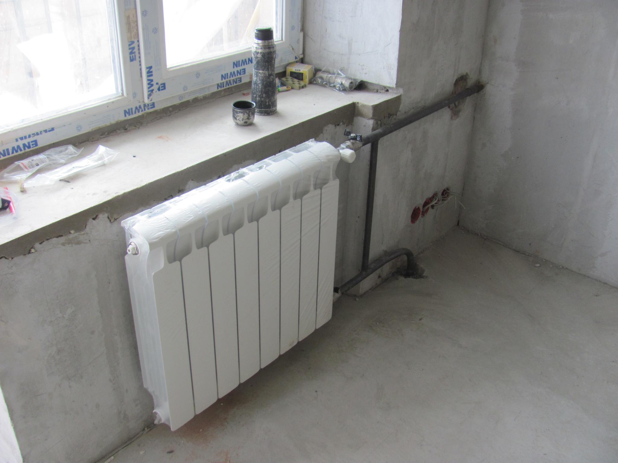 Монтаж радиаторов отопления в стену